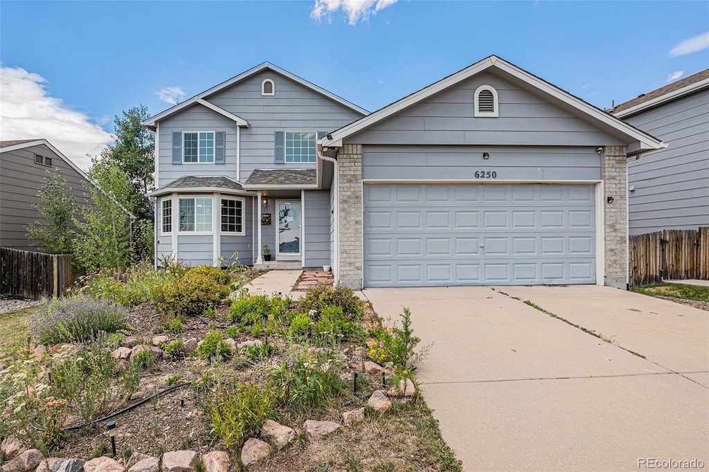 view of front of house with a garage