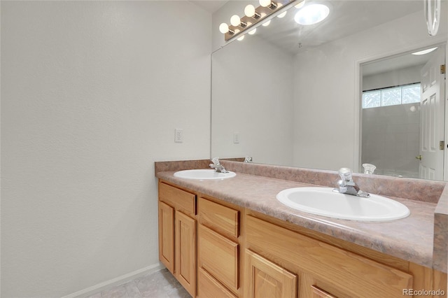 bathroom featuring vanity, tile patterned floors, and walk in shower