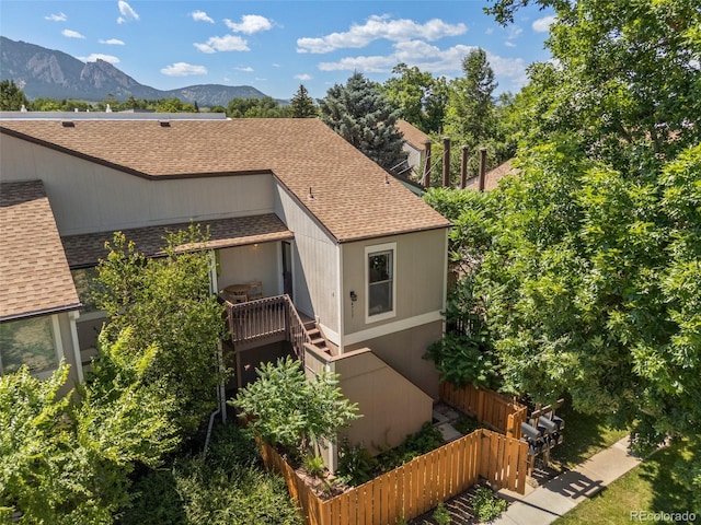 4717 Tantra Dr Unit G5, Boulder, CO 80305 - view of front of home featuring roof with shingles, a mountain view, and stairs