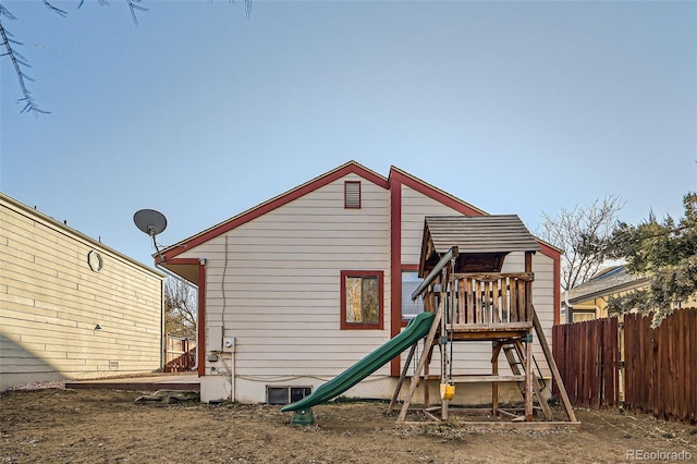 view of jungle gym with fence