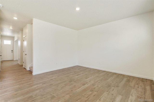 13467 Valentia St, Thornton, CO 80602 - unfurnished room featuring light wood-type flooring and recessed lighting