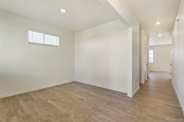13467 Valentia St, Thornton, CO 80602 - spare room featuring light wood-type flooring and recessed lighting