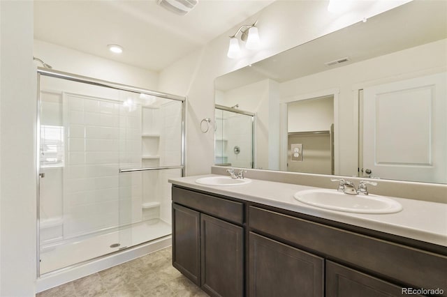 13467 Valentia St, Thornton, CO 80602 - bathroom with a shower stall and double vanity
