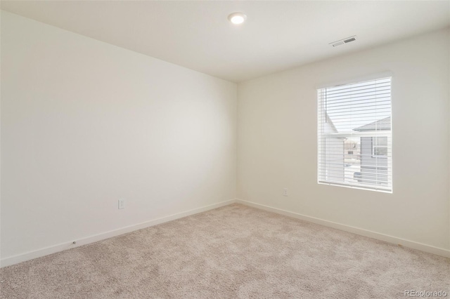 13467 Valentia St, Thornton, CO 80602 - spare room with light colored carpet and baseboards