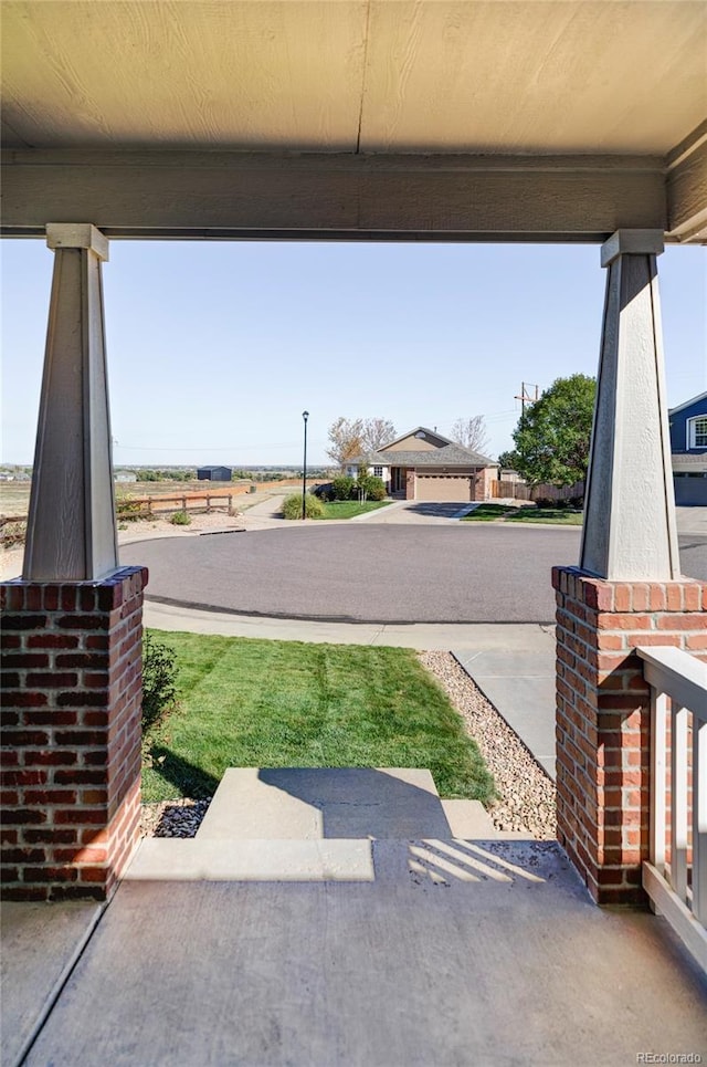 view of patio / terrace with a garage