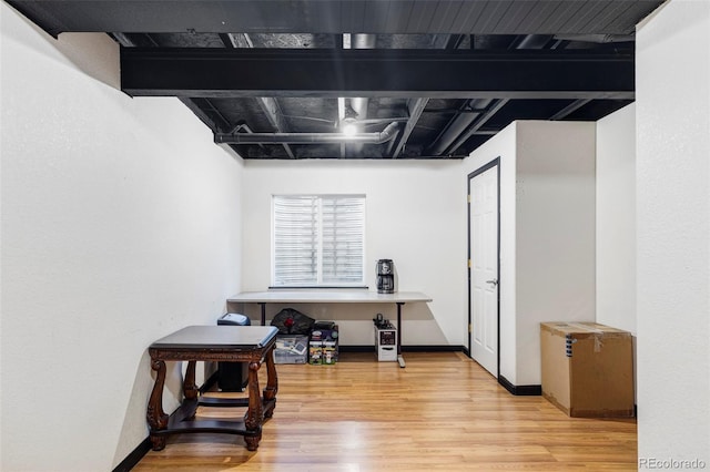 office area with hardwood / wood-style floors