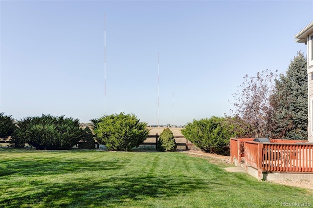 view of yard with a wooden deck