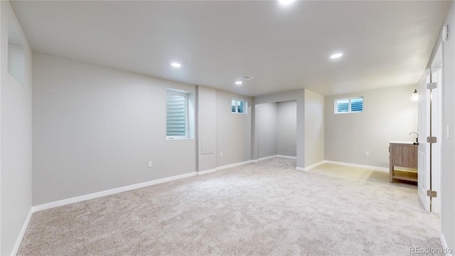 1820 W 104th Pl, Northglenn, CO 80234 - basement with light colored carpet and recessed lighting