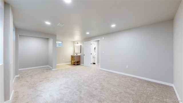 1820 W 104th Pl, Northglenn, CO 80234 - basement featuring light colored carpet and recessed lighting