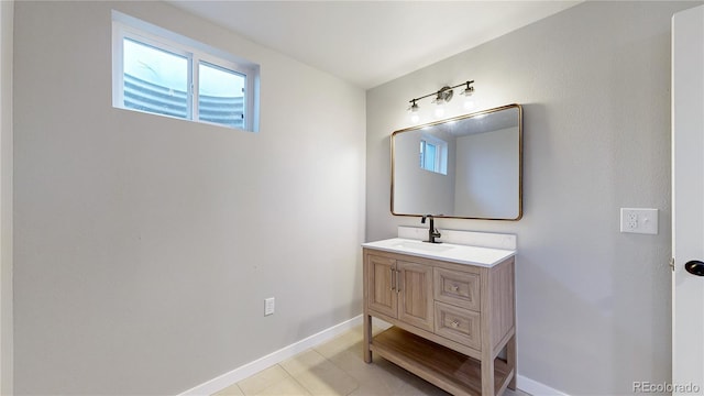 1820 W 104th Pl, Northglenn, CO 80234 - bathroom featuring vanity and baseboards