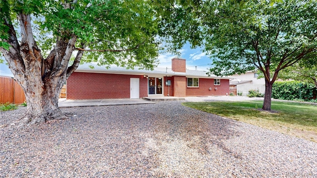 1820 W 104th Pl, Northglenn, CO 80234 - ranch-style house featuring a chimney and brick siding