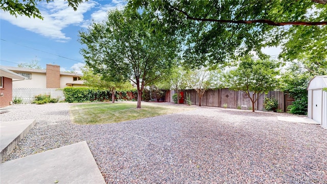 1820 W 104th Pl, Northglenn, CO 80234 - fenced backyard with a patio area