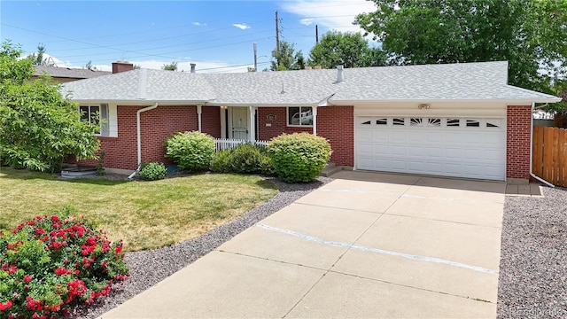 1820 W 104th Pl, Northglenn, CO 80234 - ranch-style home featuring brick siding, a garage, a shingled roof, a porch, and driveway