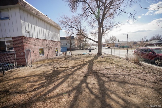 view of yard featuring fence