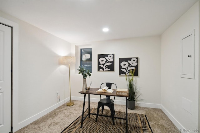 office area with carpet flooring and electric panel