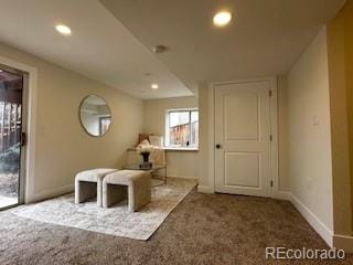 unfurnished room with carpet flooring