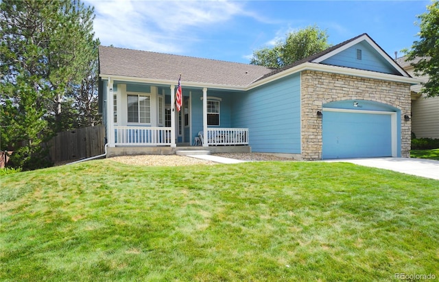 single story home featuring a garage, a porch, and a front yard