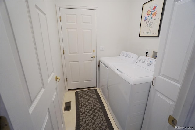 laundry area featuring independent washer and dryer