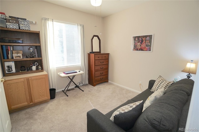 sitting room with light colored carpet