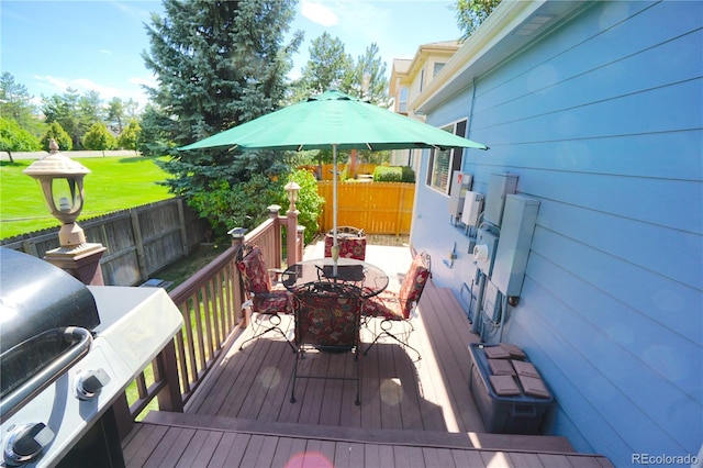 deck featuring a lawn