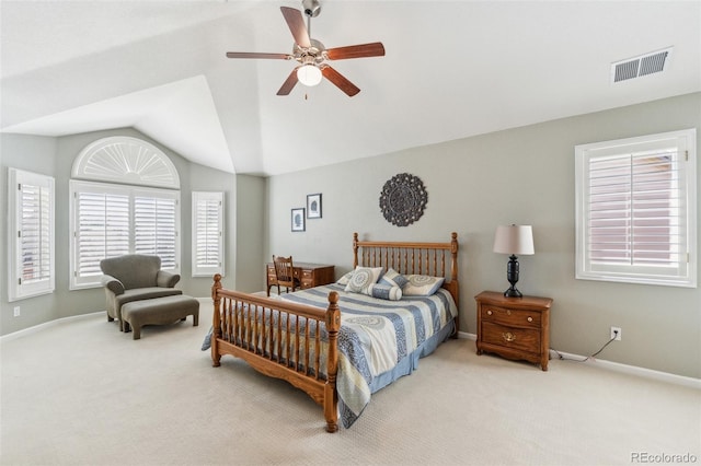 bedroom with baseboards, visible vents, carpet floors, and lofted ceiling