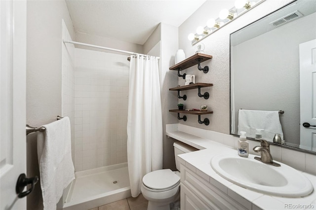 full bathroom featuring tile patterned floors, visible vents, a stall shower, and toilet