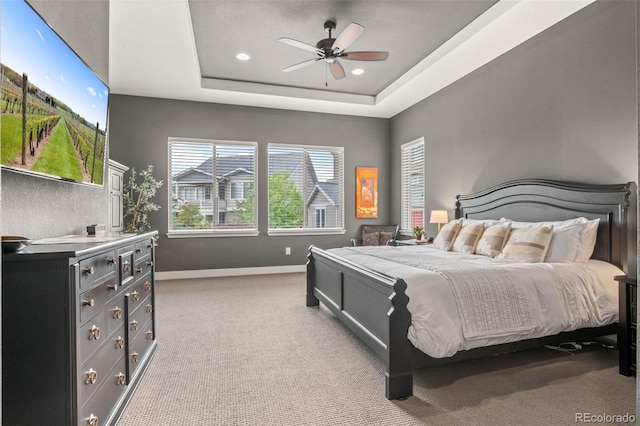 17358 W 95th Ave, Arvada, CO 80007 - bedroom featuring light colored carpet, recessed lighting, a raised ceiling, and ceiling fan
