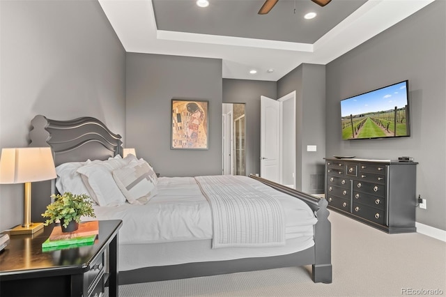 17358 W 95th Ave, Arvada, CO 80007 - carpeted bedroom featuring a tray ceiling, recessed lighting, and ceiling fan