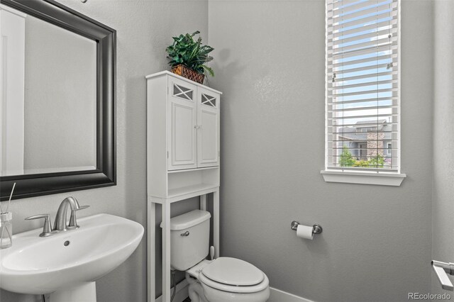 17358 W 95th Ave, Arvada, CO 80007 - half bathroom with a sink and toilet