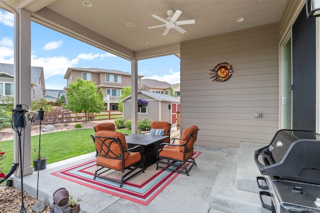 17358 W 95th Ave, Arvada, CO 80007 - view of patio / terrace featuring outdoor dining area, a storage shed, a ceiling fan, a residential view, and area for grilling