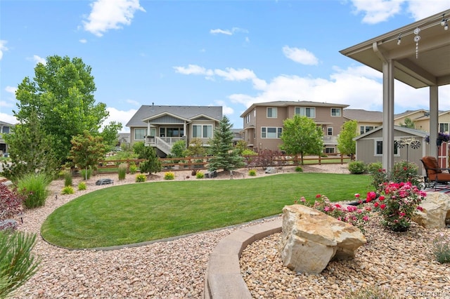 17358 W 95th Ave, Arvada, CO 80007 - view of grassy yard featuring a residential view and an outbuilding