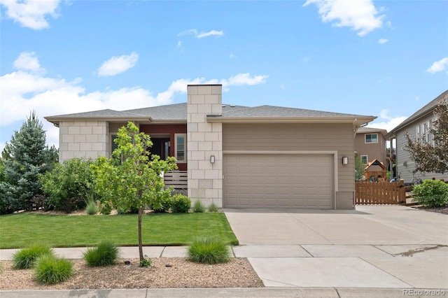 17358 W 95th Ave, Arvada, CO 80007 - view of front of house featuring a garage and driveway