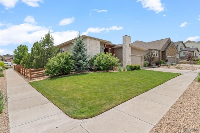 17358 W 95th Ave, Arvada, CO 80007 - view of front facade with an attached garage, a front lawn, a residential view, and concrete driveway