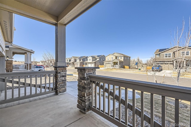 balcony featuring a residential view