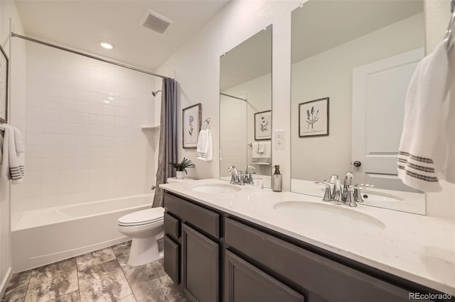 full bath with toilet, visible vents, a sink, and shower / tub combo with curtain