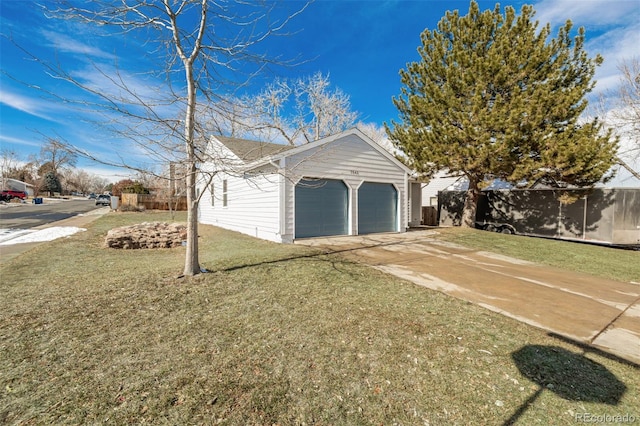 garage with a yard