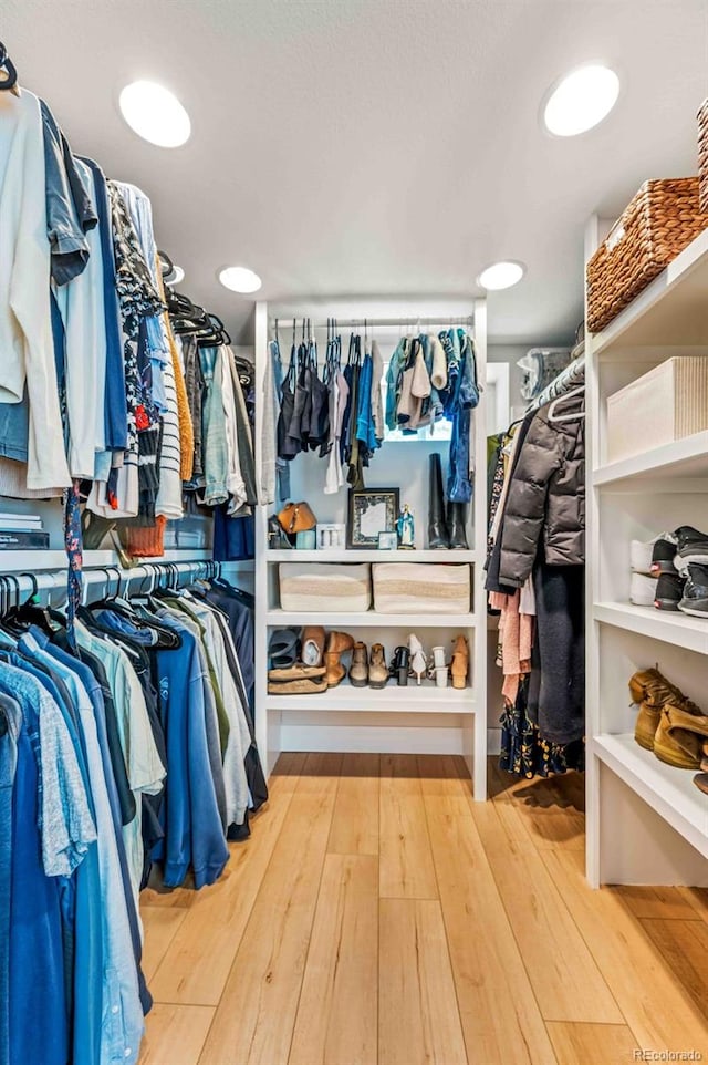 walk in closet featuring hardwood / wood-style floors