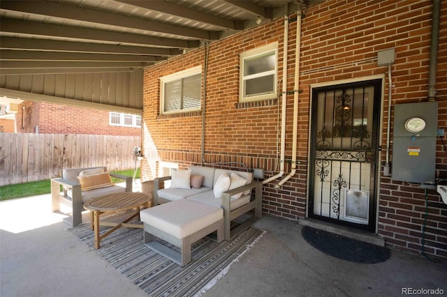 view of patio with fence and an outdoor living space