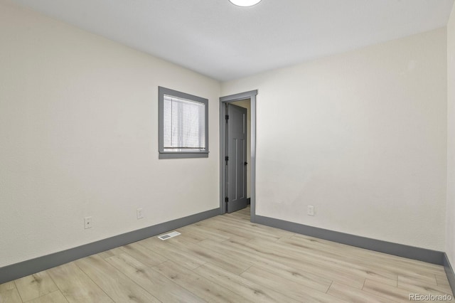 104 Stuart St, Denver, CO 80219 - unfurnished room featuring light wood finished floors and baseboards
