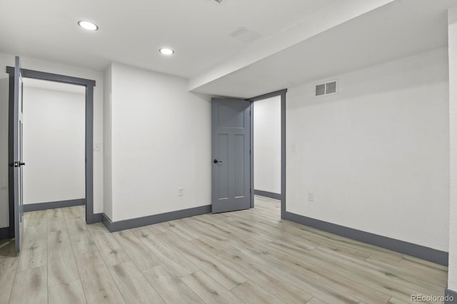 104 Stuart St, Denver, CO 80219 - empty room with baseboards, light wood-style floors, and recessed lighting