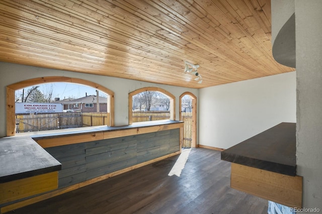 104 Stuart St, Denver, CO 80219 - misc room with wood ceiling, healthy amount of natural light, baseboards, and wood finished floors