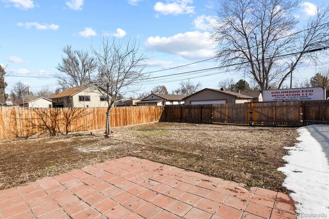 104 Stuart St, Denver, CO 80219 - fenced backyard with a patio area