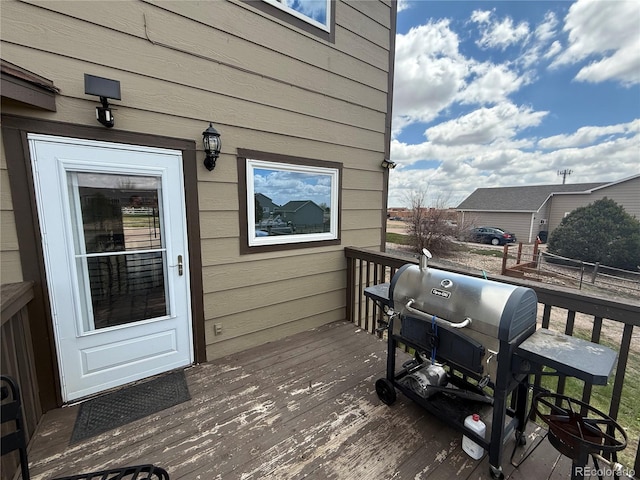 8318 Ivory Loop, Peyton, CO 80831 - wooden terrace with area for grilling