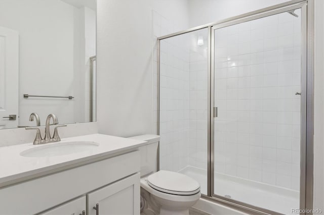8229 Butte Creek St, Littleton, CO 80125 - bathroom with a shower stall, toilet, and vanity