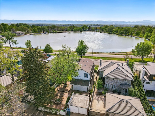 aerial view of residential area with a water and mountain view