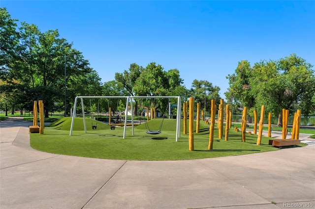 community play area with a lawn