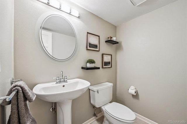 345 Harrison St, Denver, CO 80206 - half bathroom with toilet and baseboards