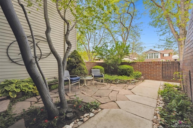 345 Harrison St, Denver, CO 80206 - view of patio featuring a fenced backyard