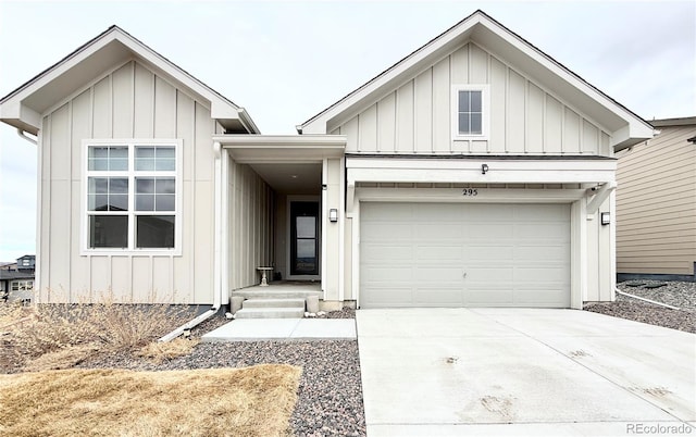 modern farmhouse style home with board and batten siding, concrete driveway, and an attached garage