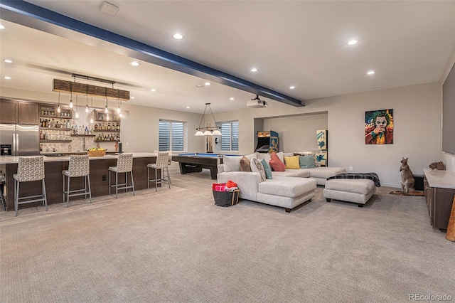 carpeted living room featuring bar and pool table